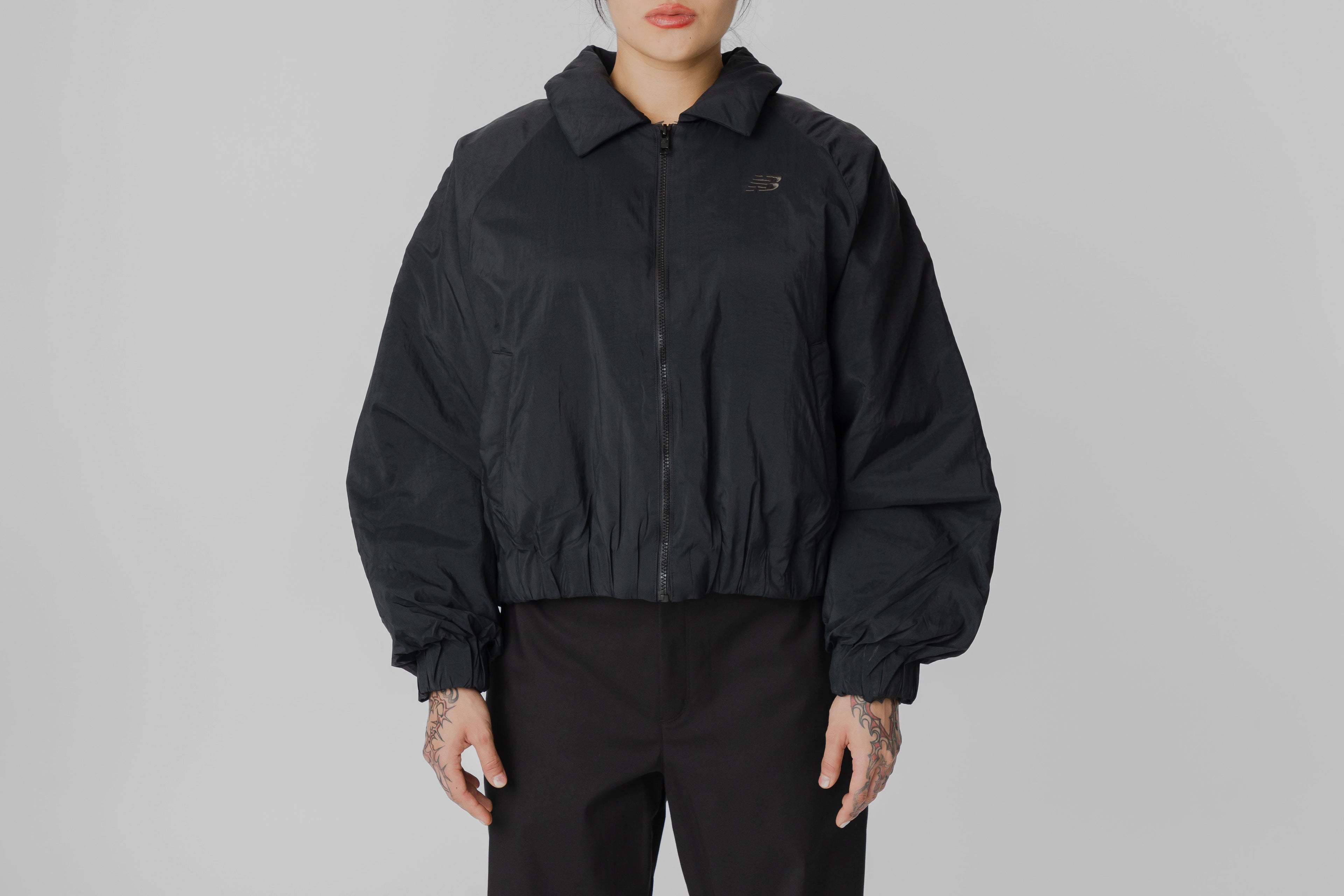 Women's New Balance Casaca Woven Bomber - WJ61D8YX_BK - Lust México