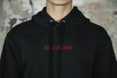 M J AIR JDN WM FLC HOODIE BLACK/GYMRED (6872883789890)